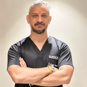 Dr. Dinesh Thakur